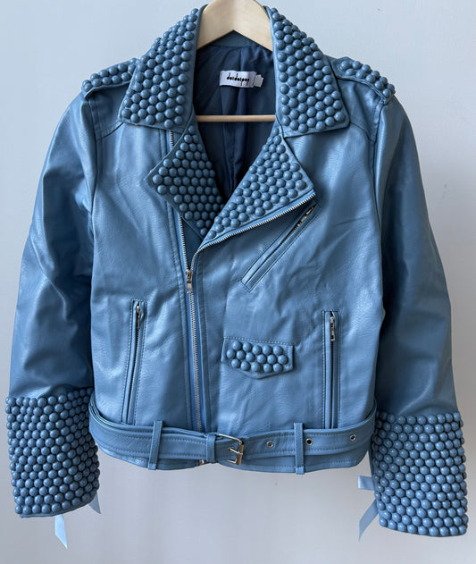 Blue faux PU leather moto biker jacket showcasing dome studs and satin lace-up sleeves.