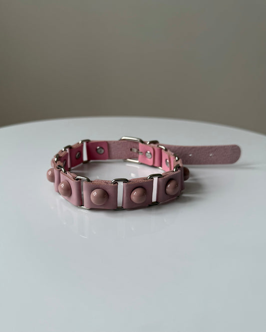 DOTDOTPOP pink dome studded choker necklace with PU faux leather. Edgy and trendy design for streetwear and statement fashion.