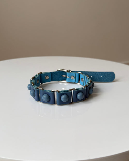DOTDOTPOP blue dome studded choker necklace with PU faux leather. Edgy and trendy design for streetwear and statement fashion.